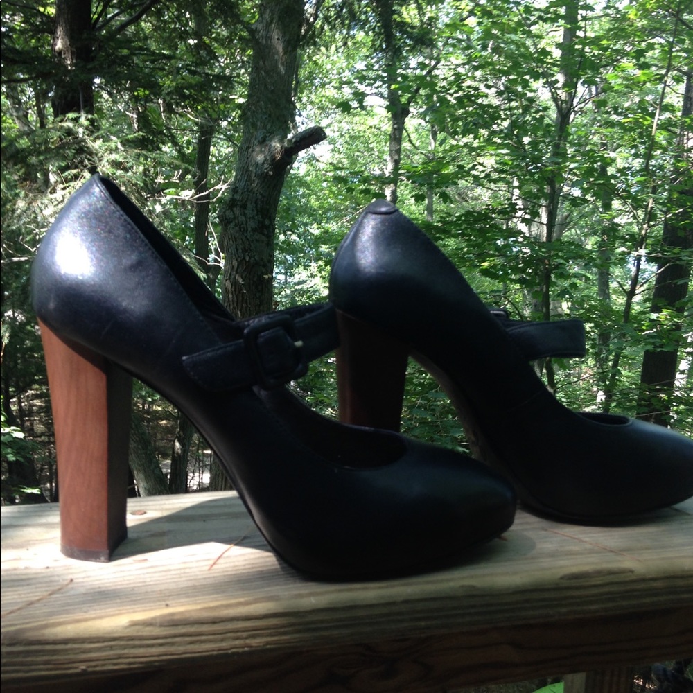 Black, leather and wood heeled maryjanes by Joie.